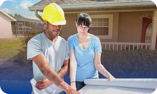 Homeowner and contractor going over plans of a project