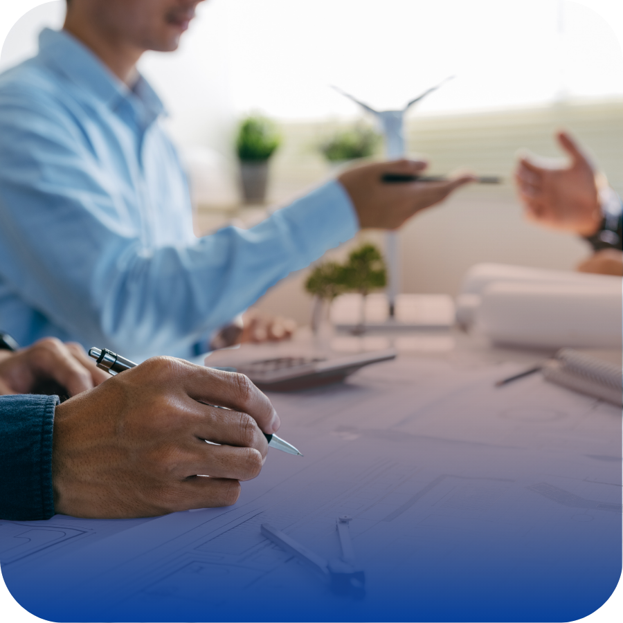 A man is engaged in writing on paper, showcasing his concentration and attention to detail.