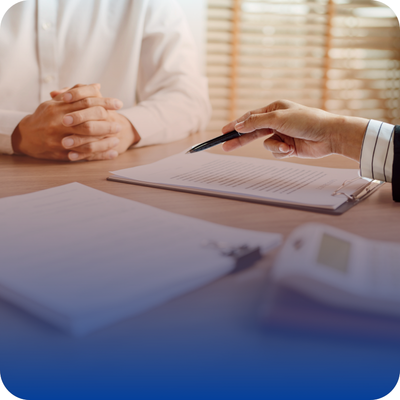Two people in a business meeting at a table, collaborating on identity and background screening for homeowners' contractors.