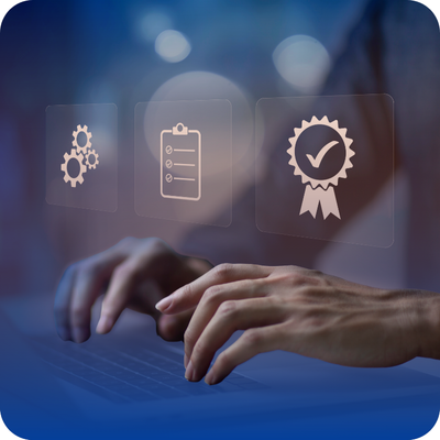 A person engaged in typing on a laptop, with visible icons that represent licensing and certification for contractors.