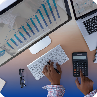 A person engaged with a calculator and laptop, symbolizing the review integration process for a contractor directory company.