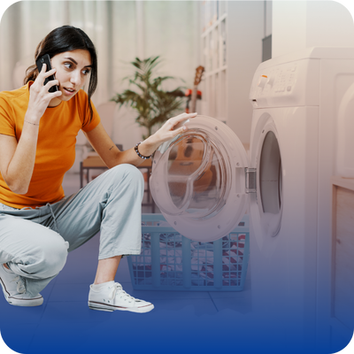 A woman speaking on a cell phone, possibly discussing home repair issues like water leaks or frozen lines.